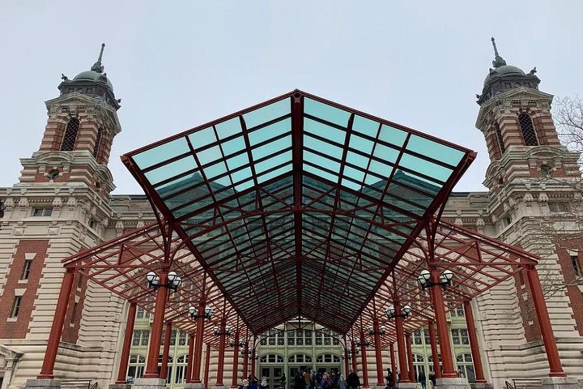 a building with a large glass structure in front of it