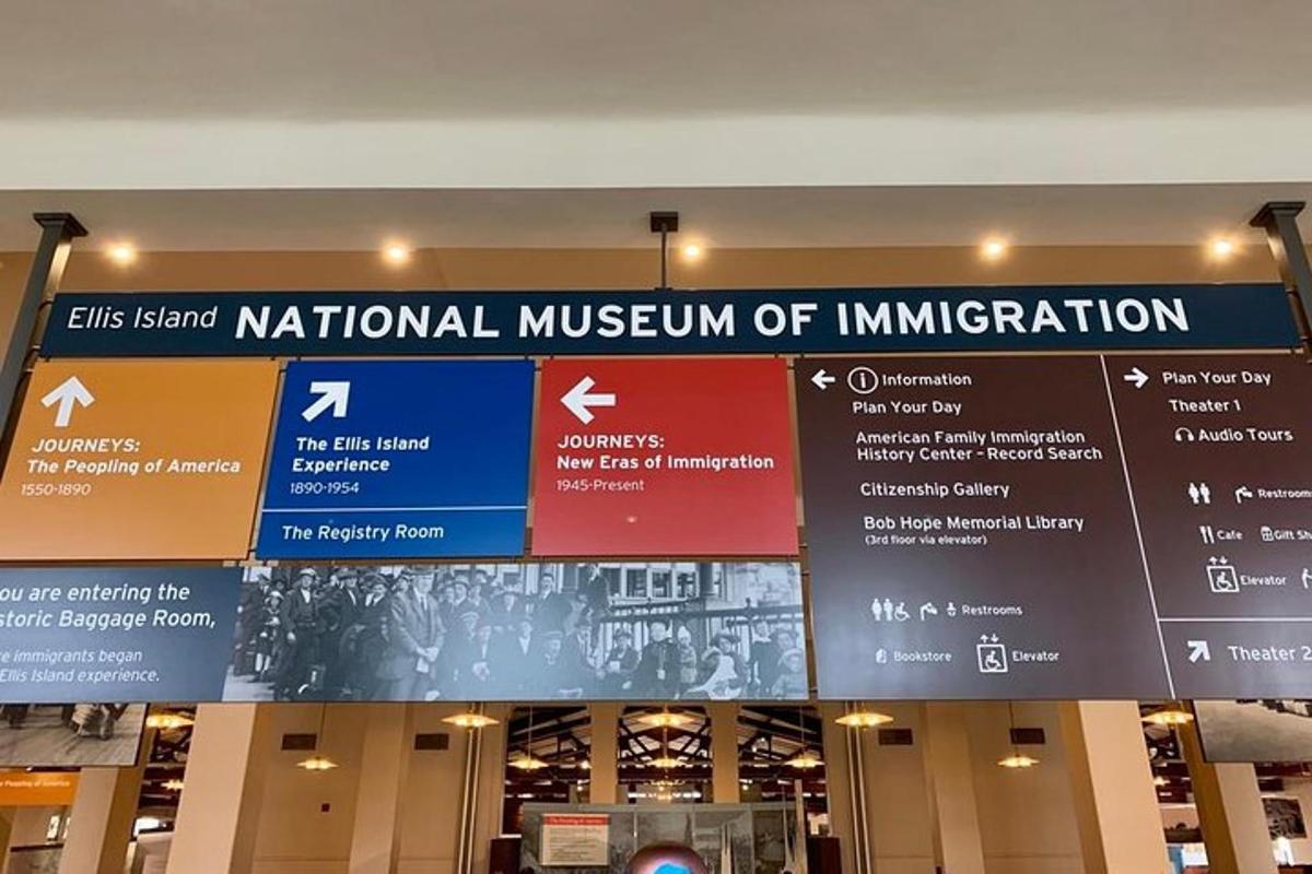 a sign at the entrance to the national museum of immigration