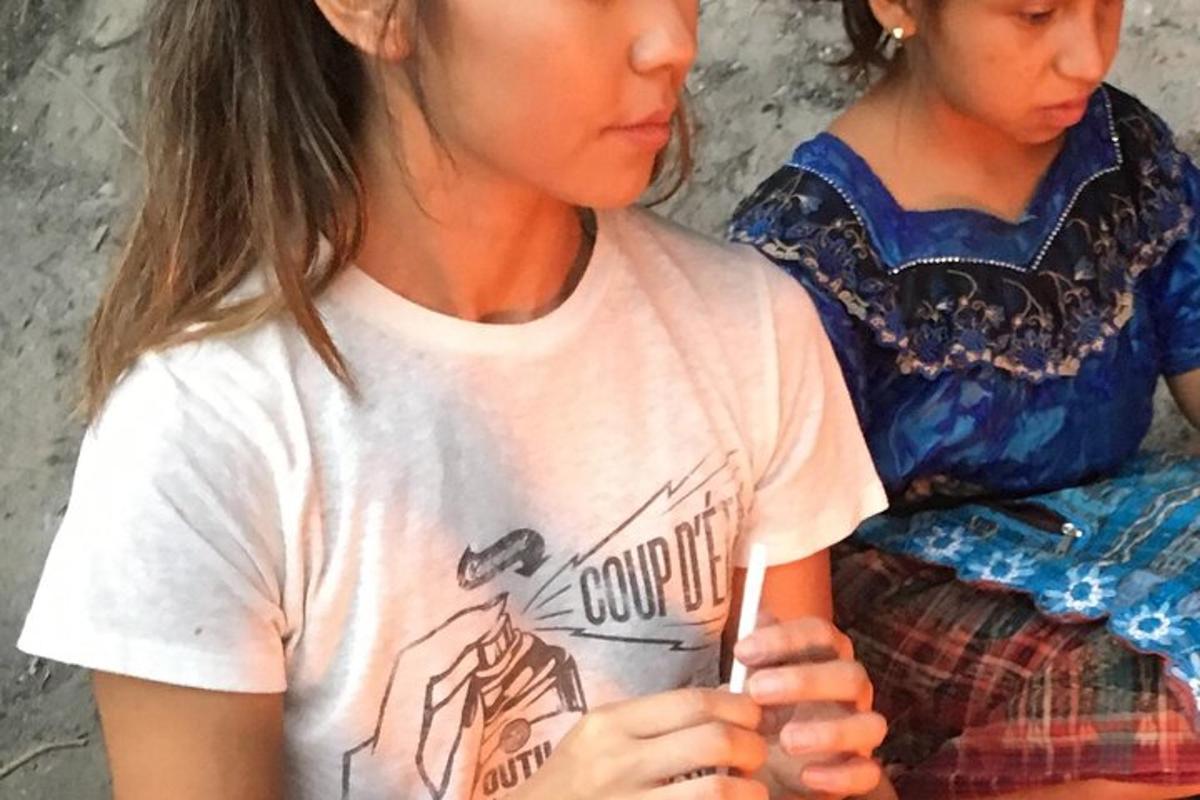 two young girls sitting next to each other