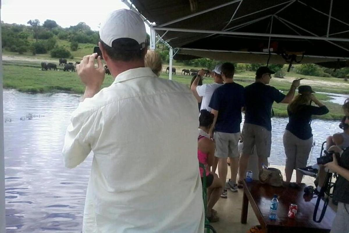 a man taking a picture of a group of people