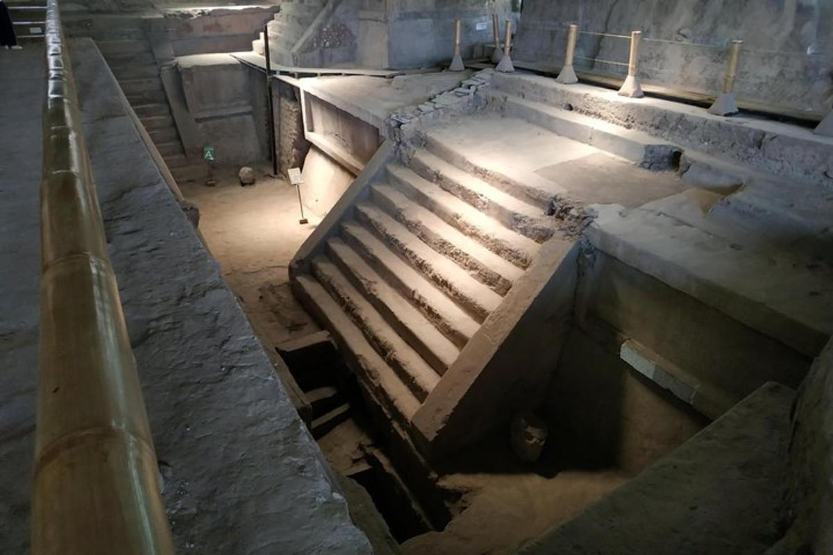 an old building with stairs in a room