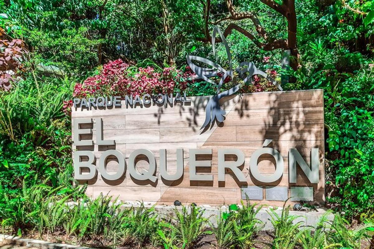 a sign for a botanical garden with flowers on it
