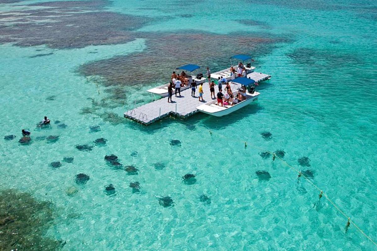 a group of people on a boat in the water