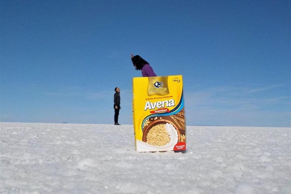 a person standing on top of a box in the snow