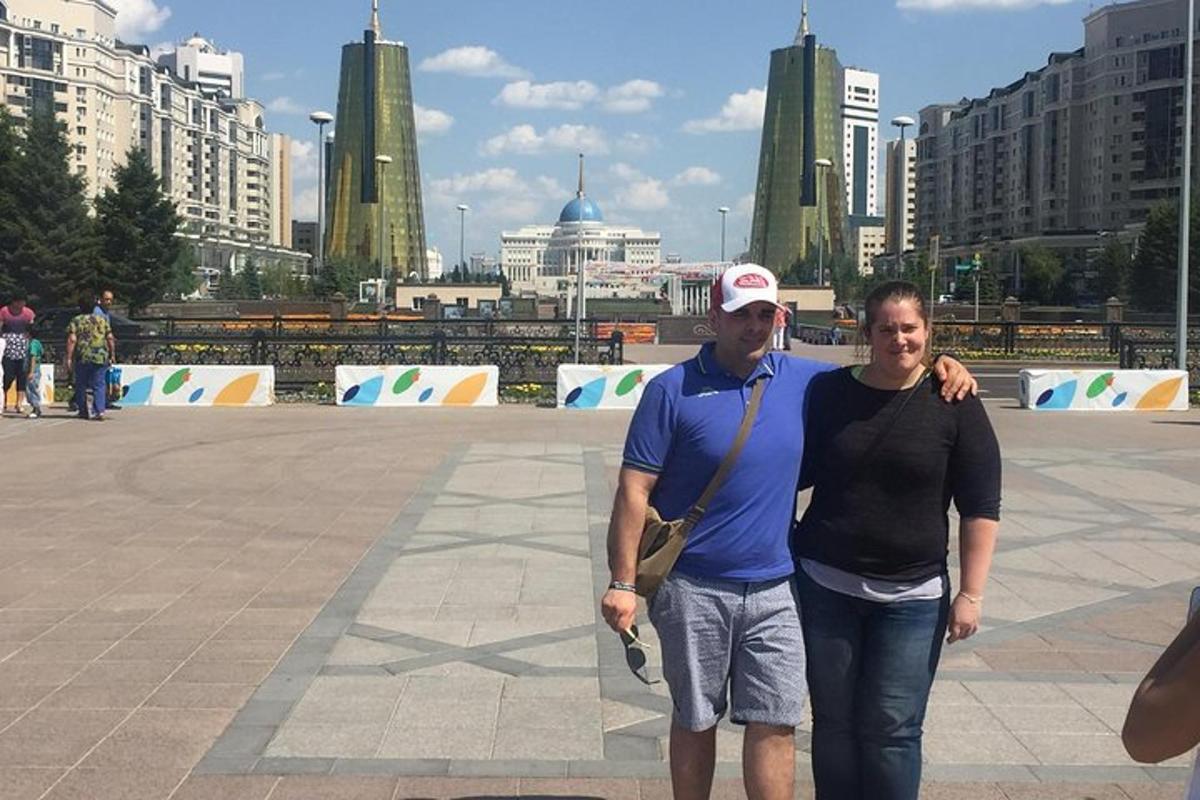 a man and a woman standing in a city
