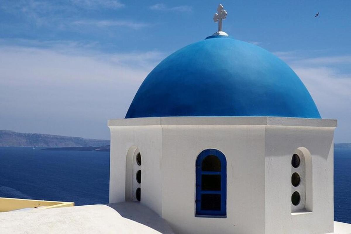 a blue and white church with a blue dome