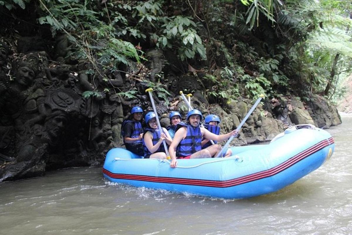 a group of people on a raft in the river