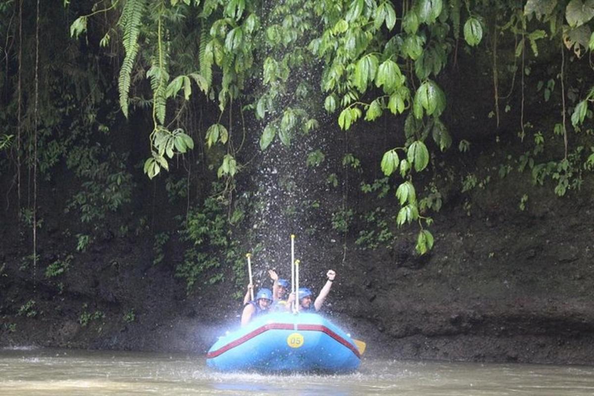a group of people on a raft in the water