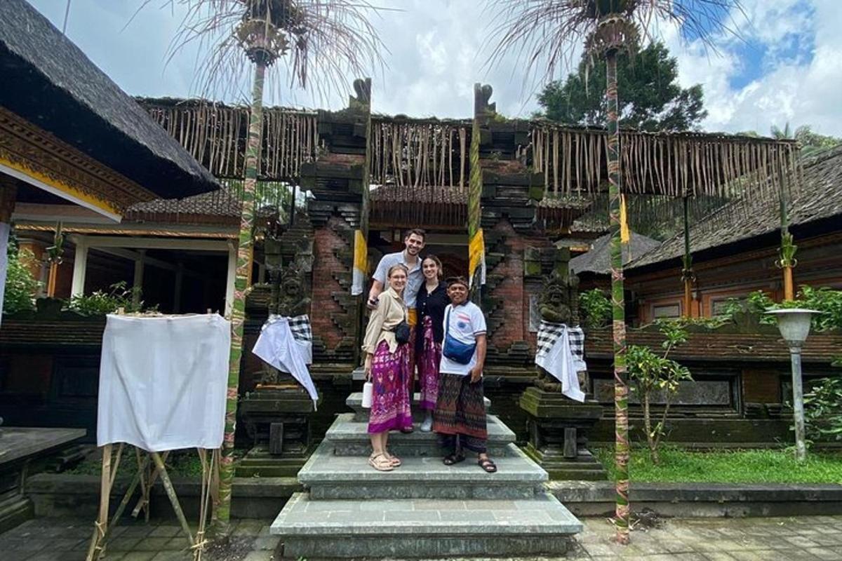 a group of people standing on steps in front of a building