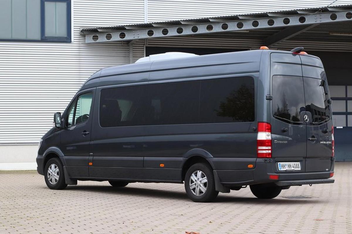 a black van parked in front of a building