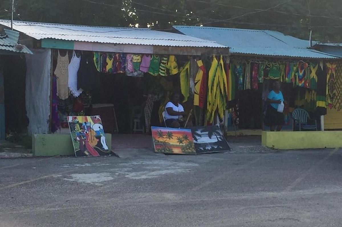 a store with paintings and art equipment in front of it