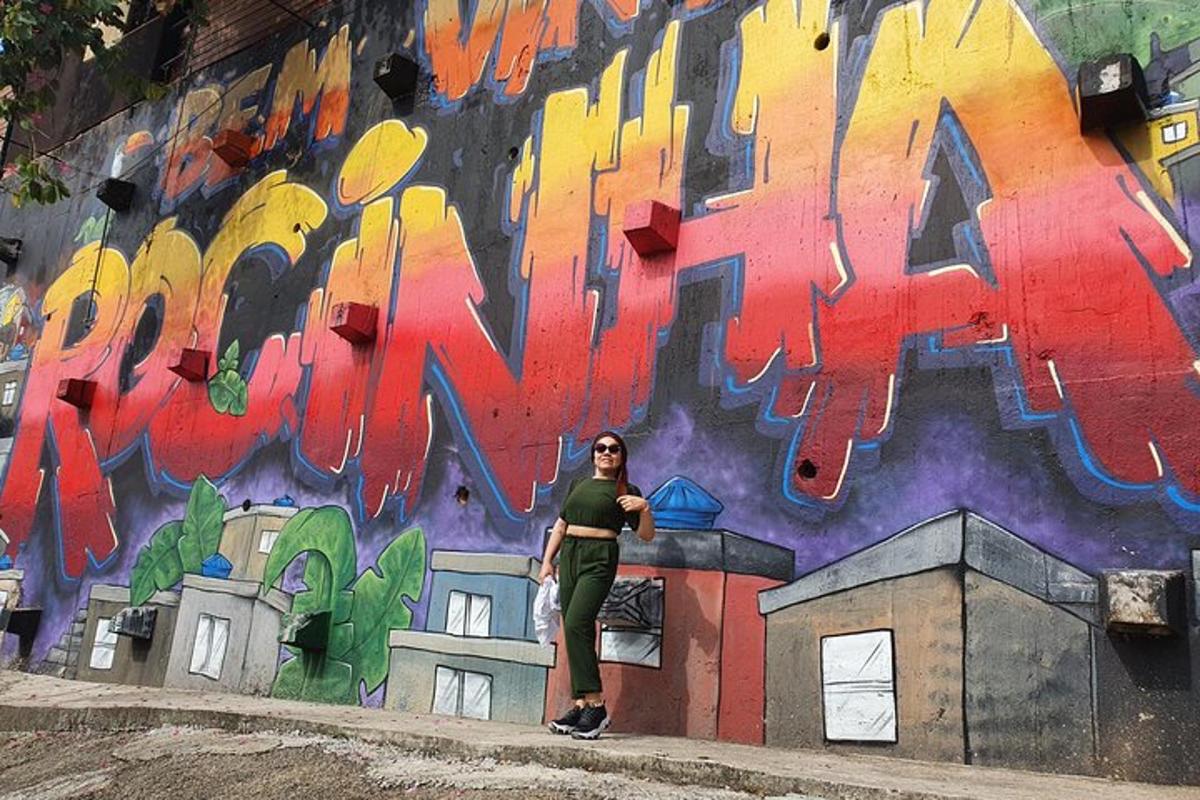 a woman standing in front of a wall with graffiti