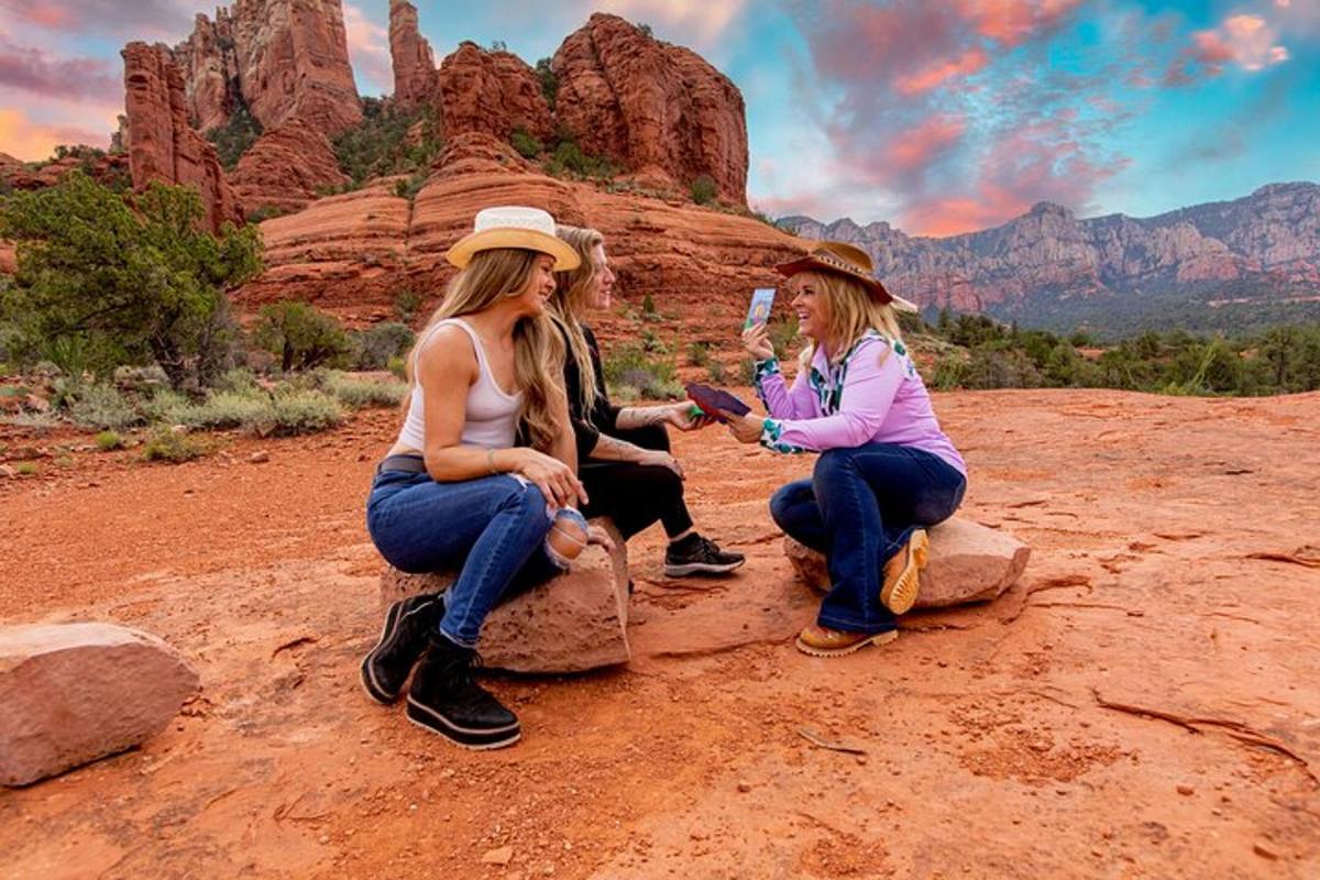 due donne sedute sulle rocce nel deserto