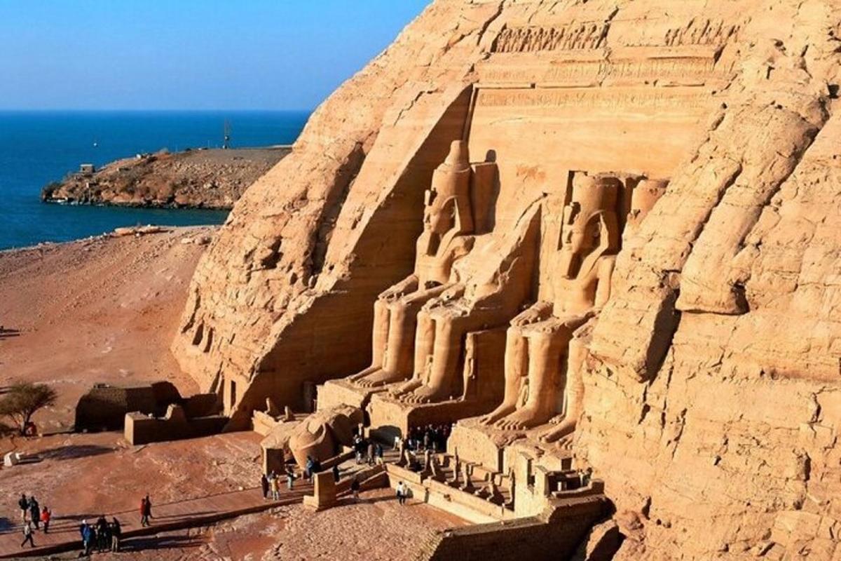 a large sand castle on the side of a cliff