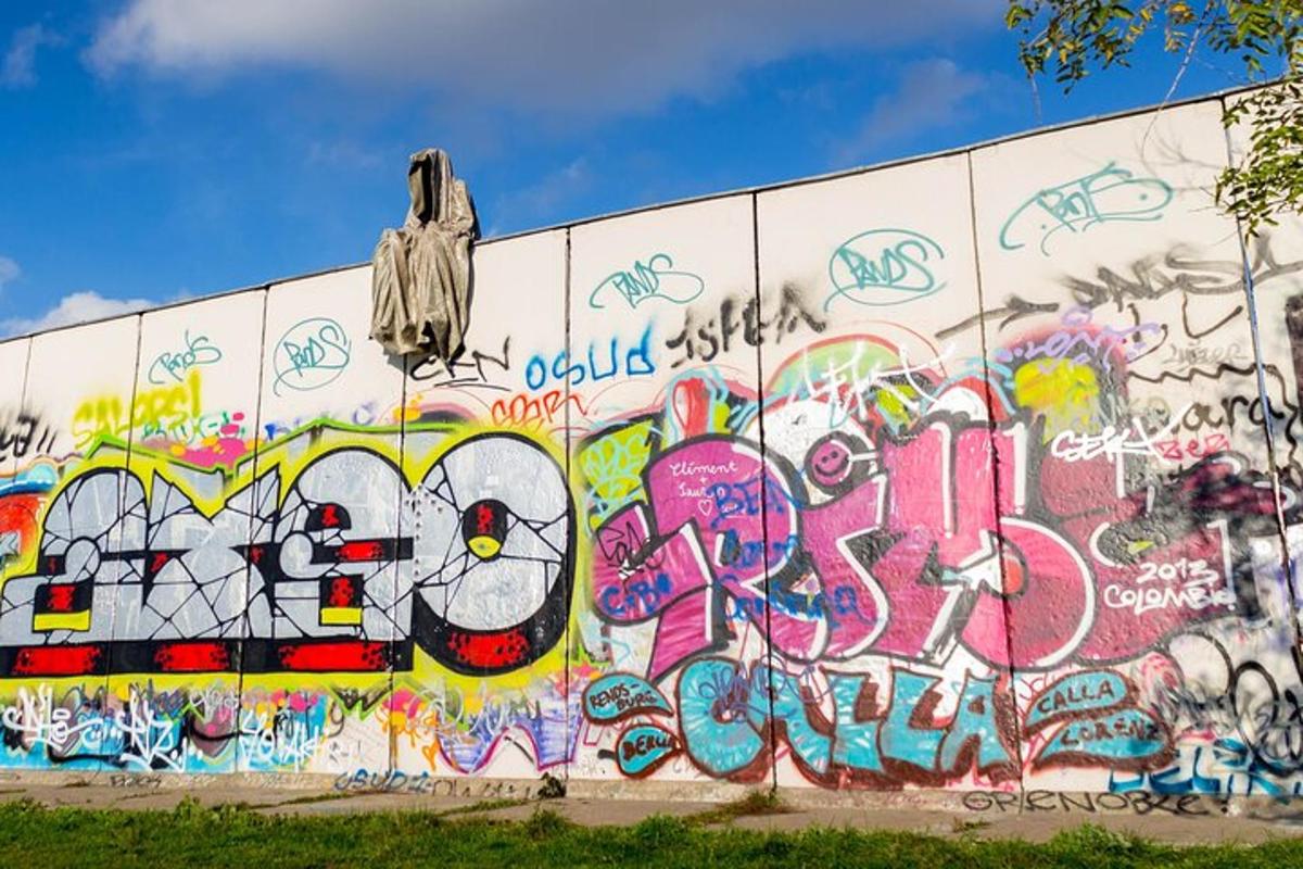 a wall covered in graffiti with a wall covered in graffiti