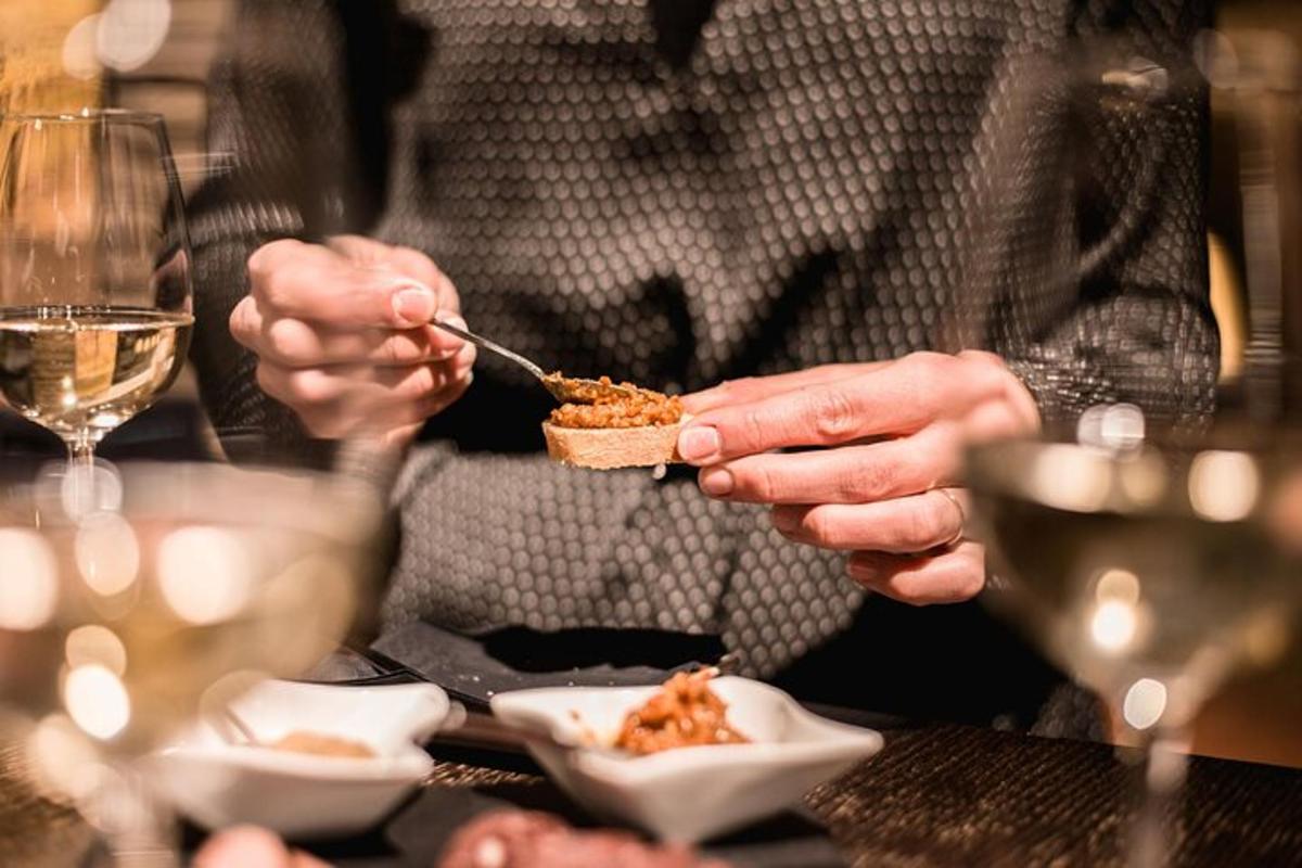 a man eating food with a fork and a plate of food