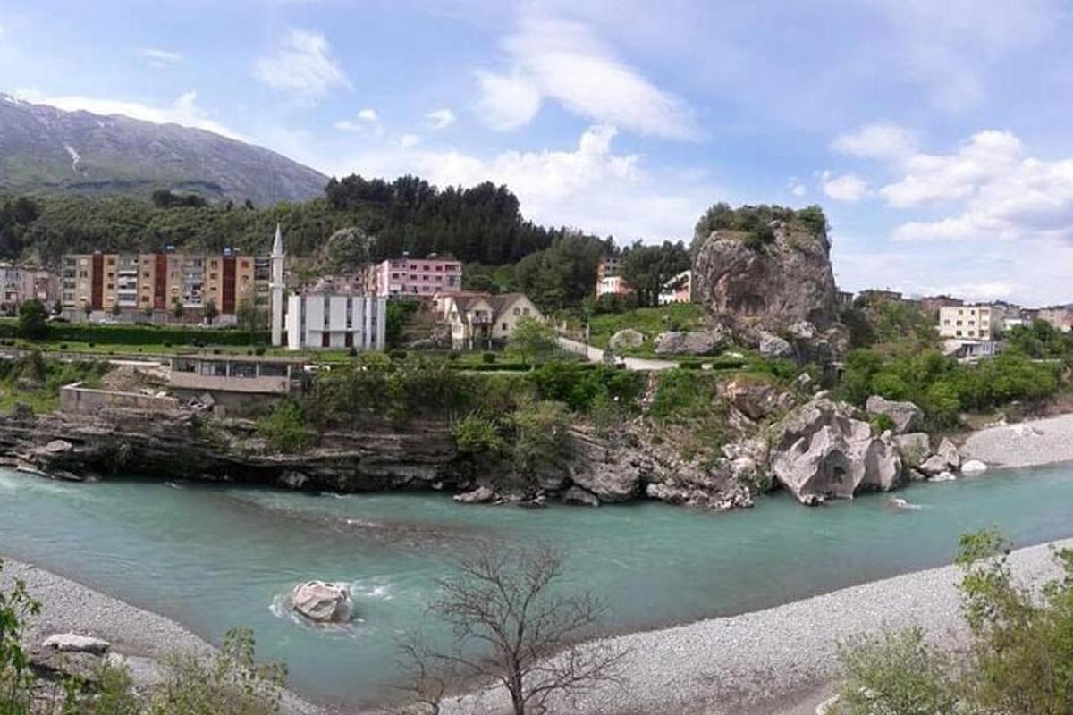 a view of a river with a city and buildings