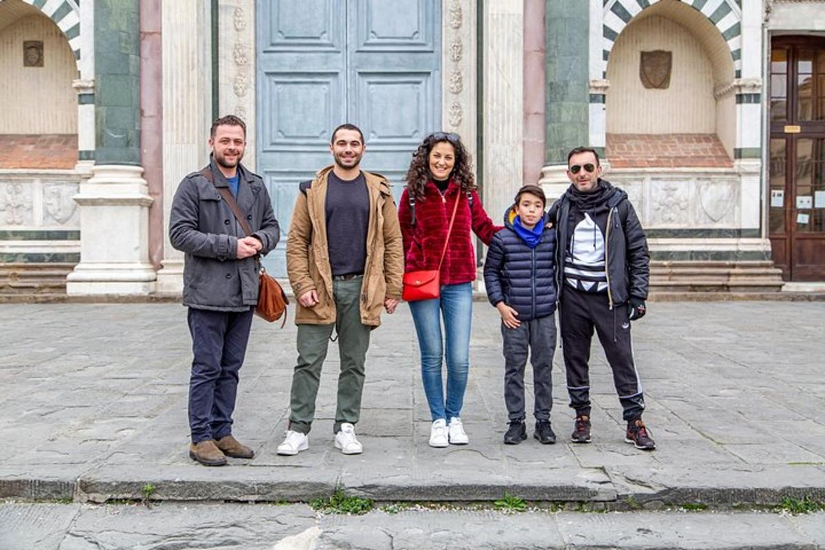 a group of people standing in front of a building