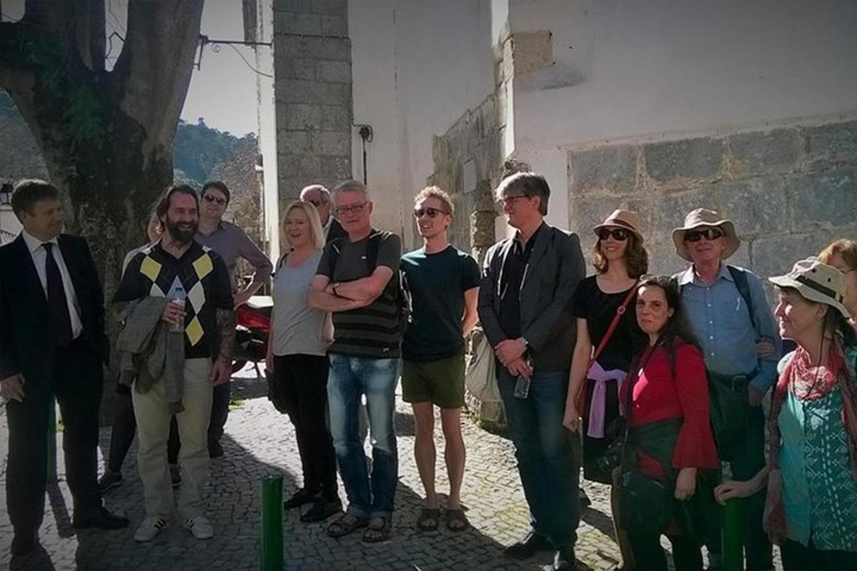 a group of people standing in front of a building