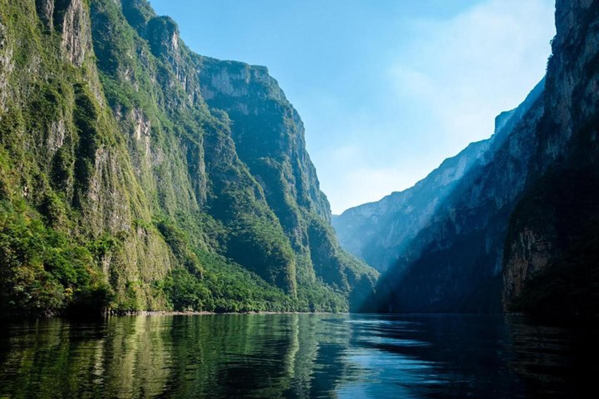 a view of a river between two mountains