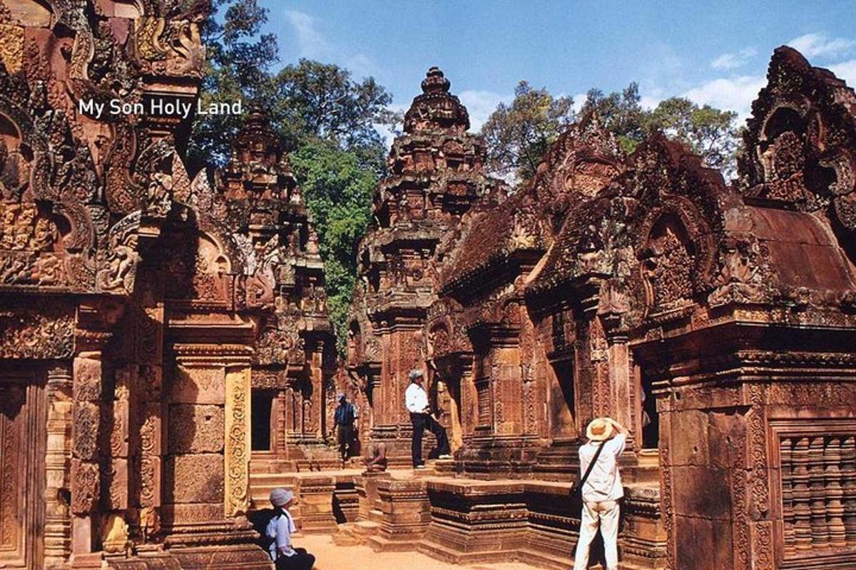 a group of people standing in front of a temple