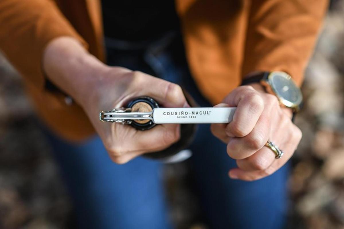 a person holding a pair of keys