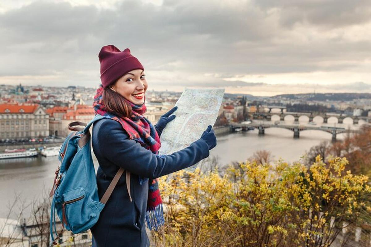 a woman holding up a map in front of a city