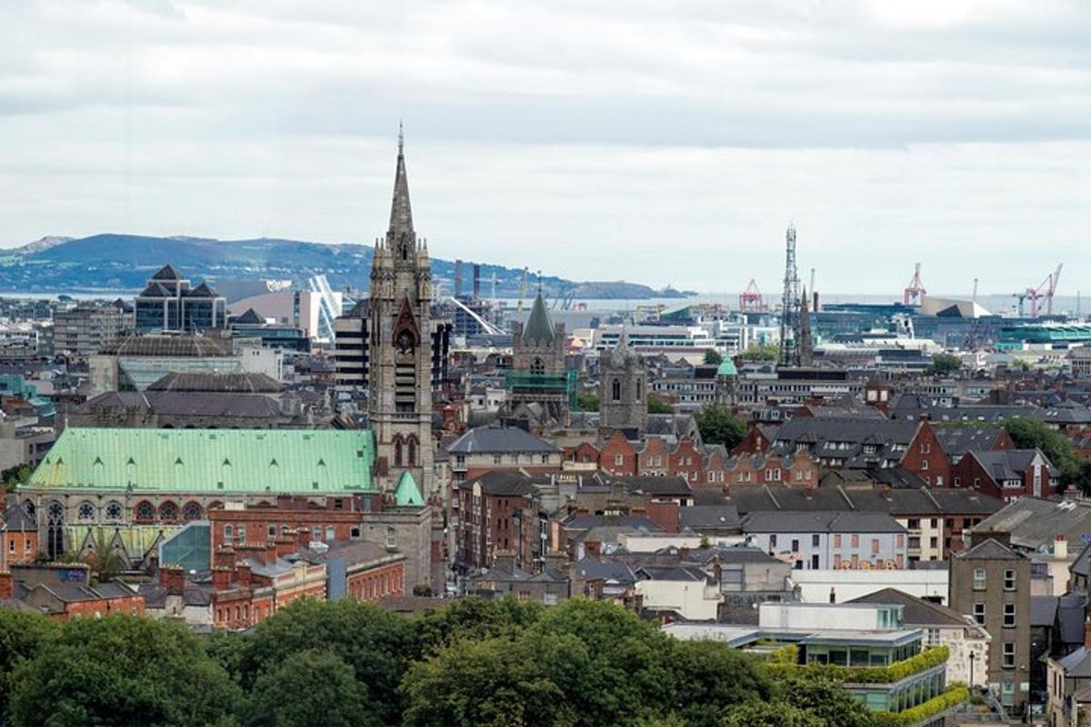 an aerial view of a city with a clock tower