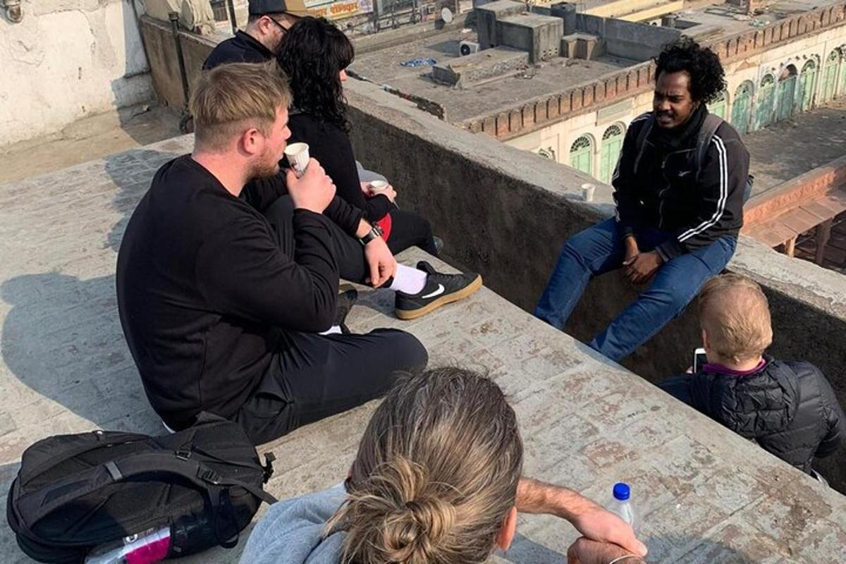 a group of people sitting on the steps