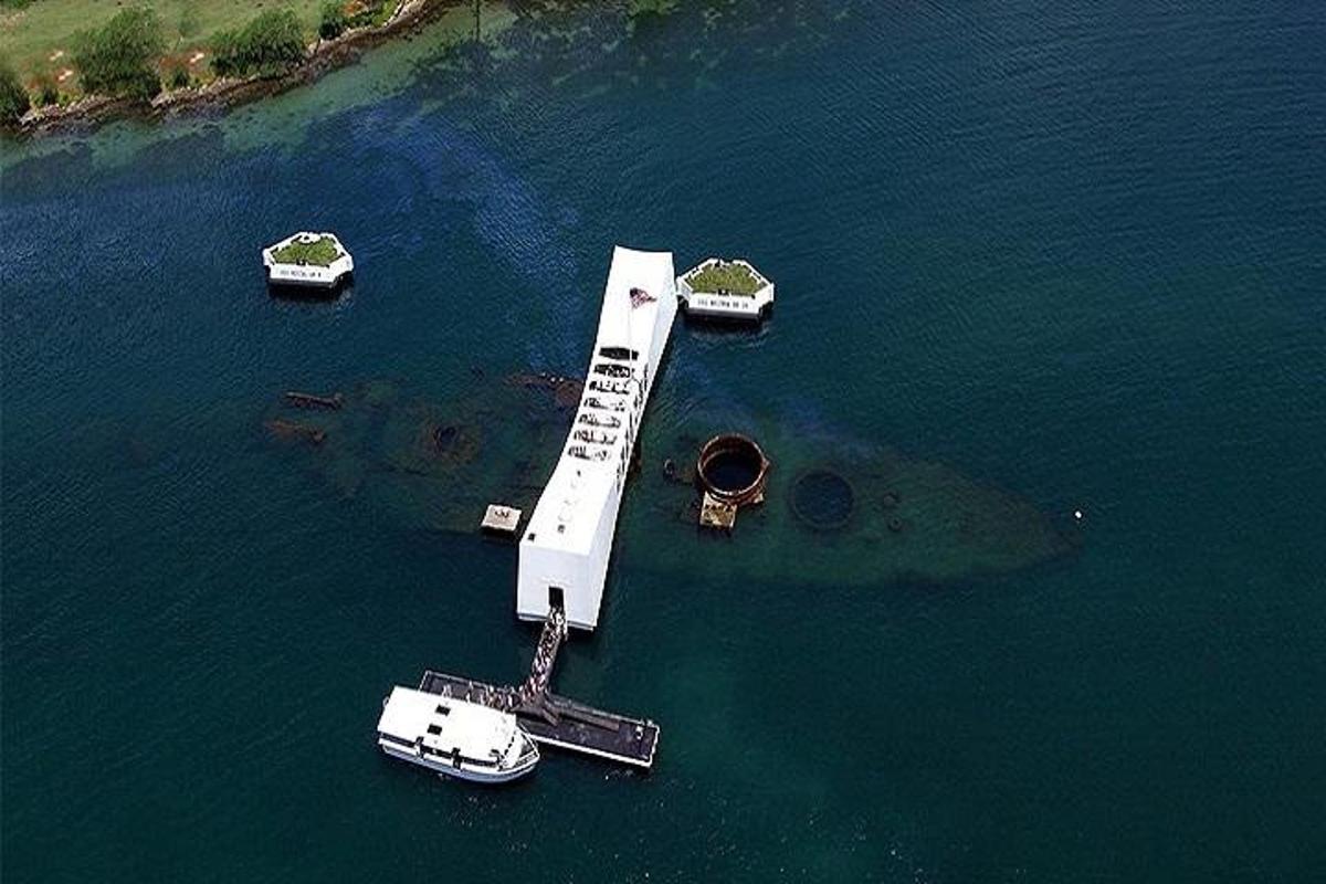 a dock with a boat in the water