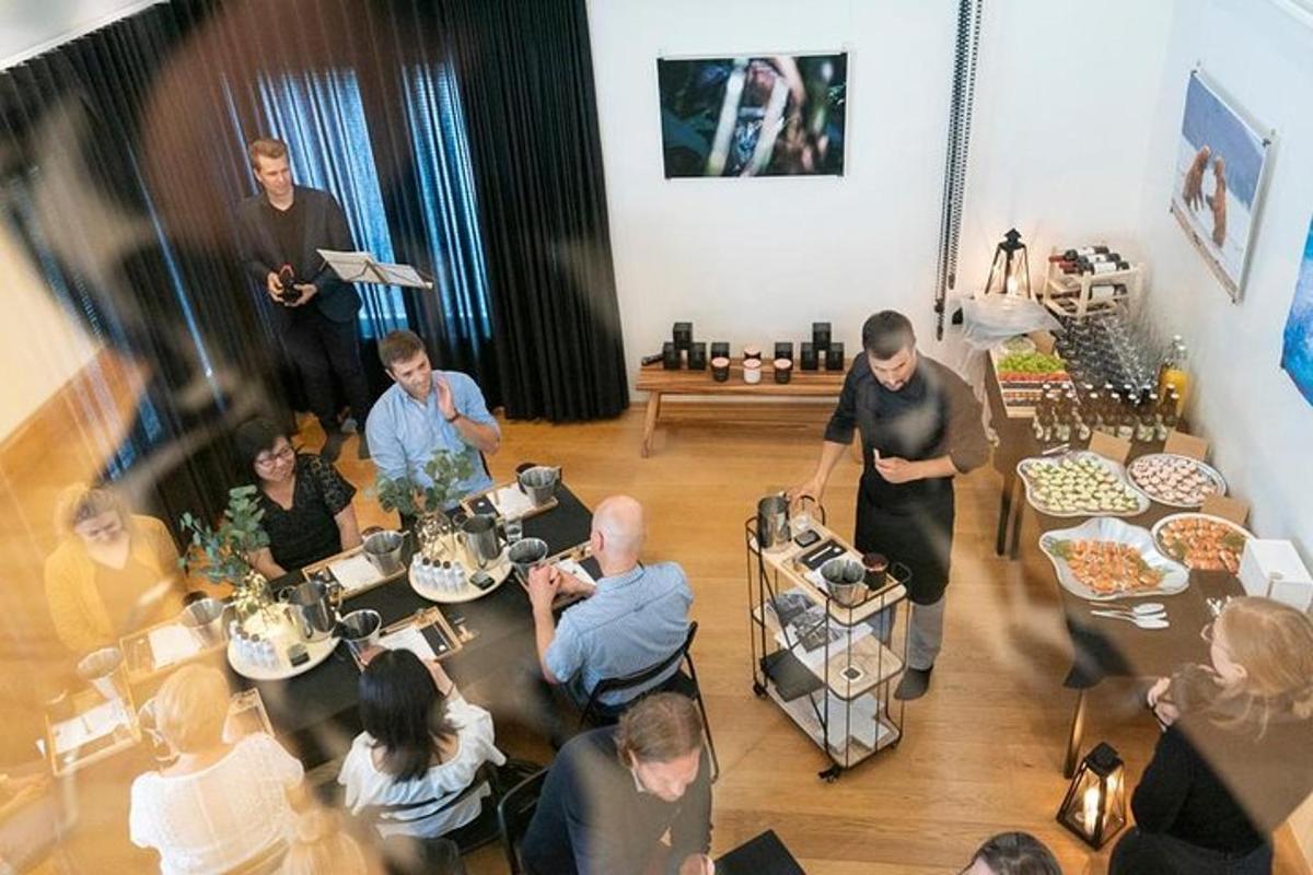 a group of people sitting at tables in a room