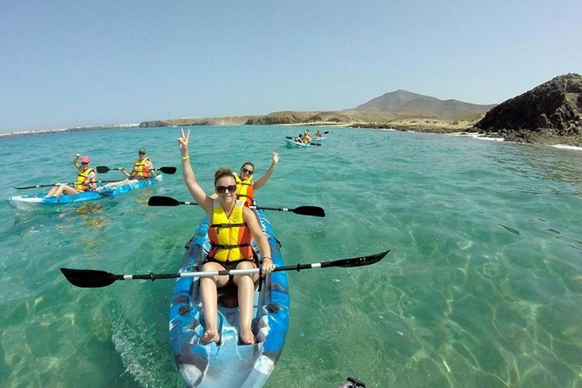 a group of people on a kayak in the water