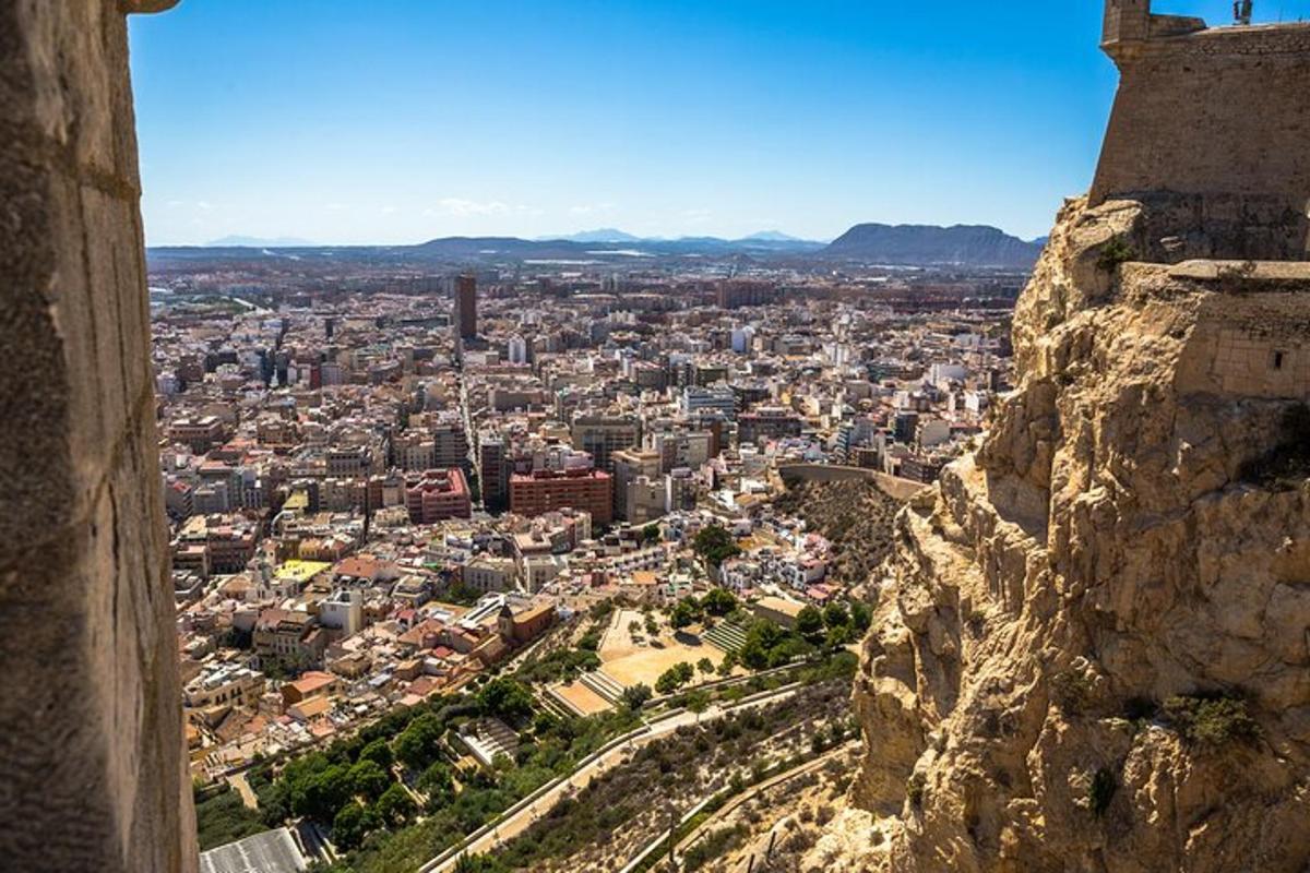 a view of a city from the mountain