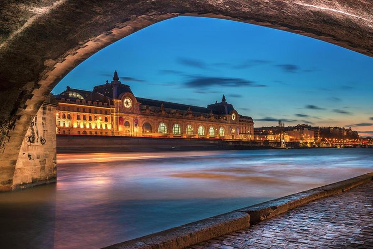 a view of a building from under a bridge