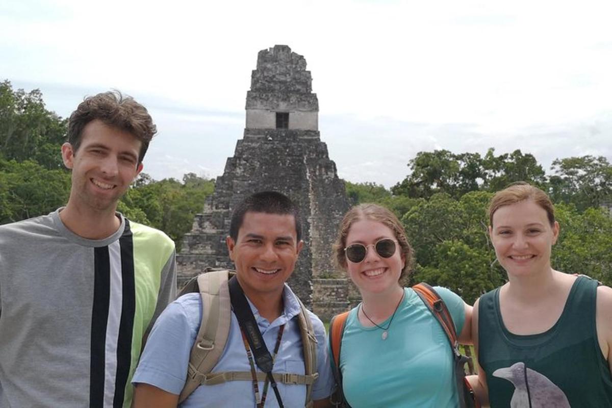a group of people standing in front of a temple