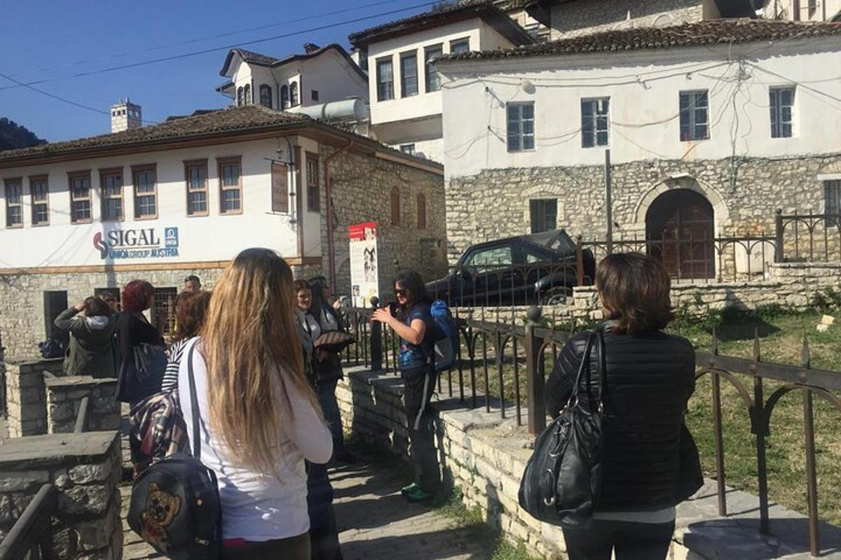 a group of people standing outside of a building