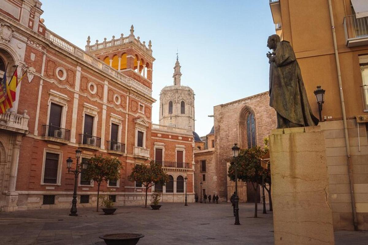a statue of a woman standing in a courtyard
