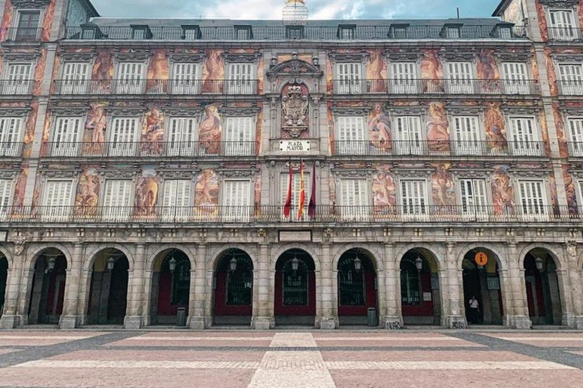 a large building with portraits on the side of it