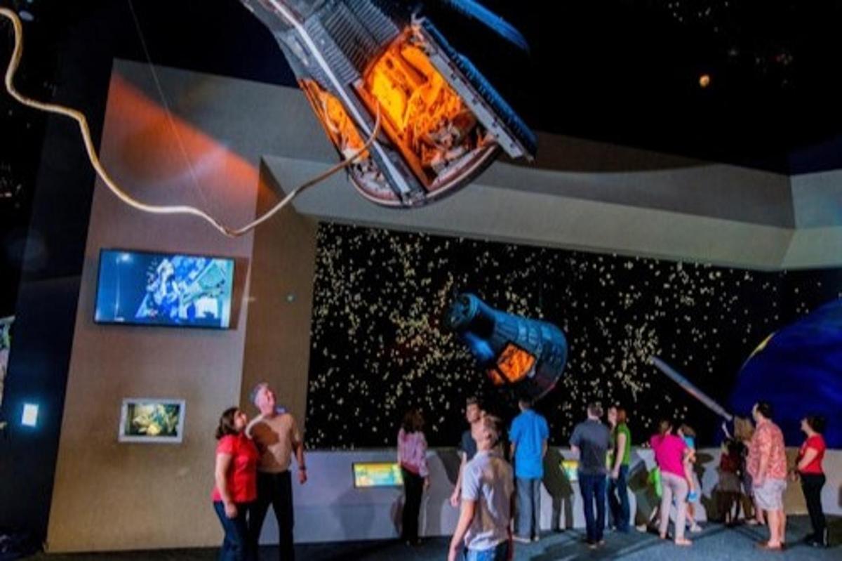 a group of people watching a person doing tricks on a stage