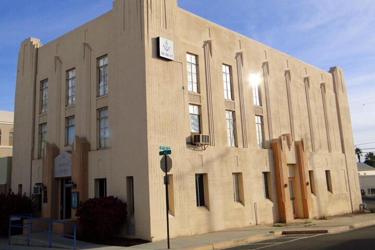 a large building with a clock on the side of it