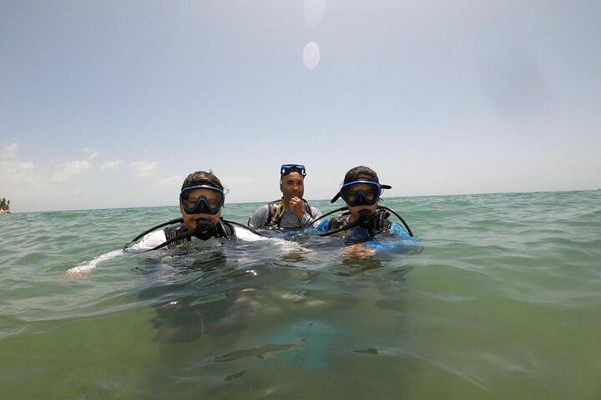 a group of three people in the water