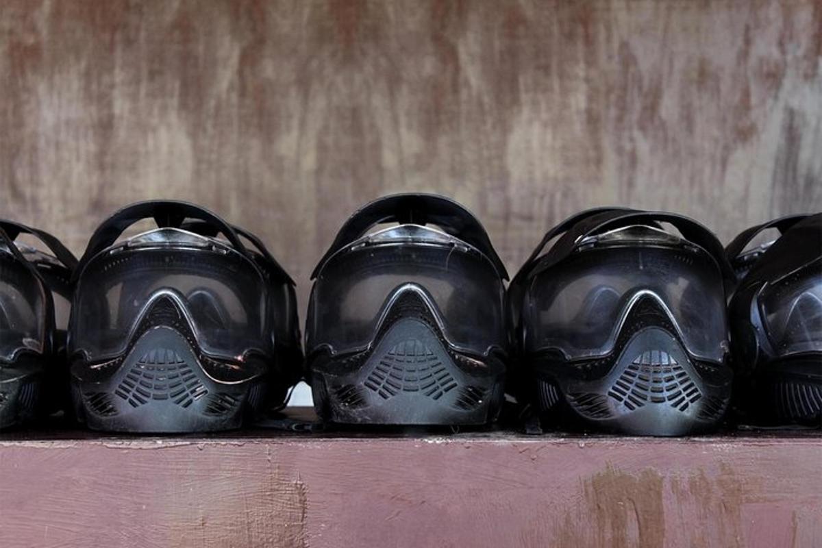 a group of black shoes sitting on a shelf