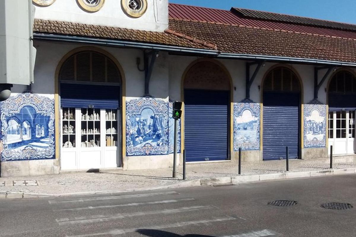 a building with blue and white tiles on the side of it