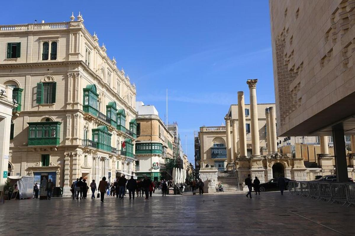 a group of people walking in a city street