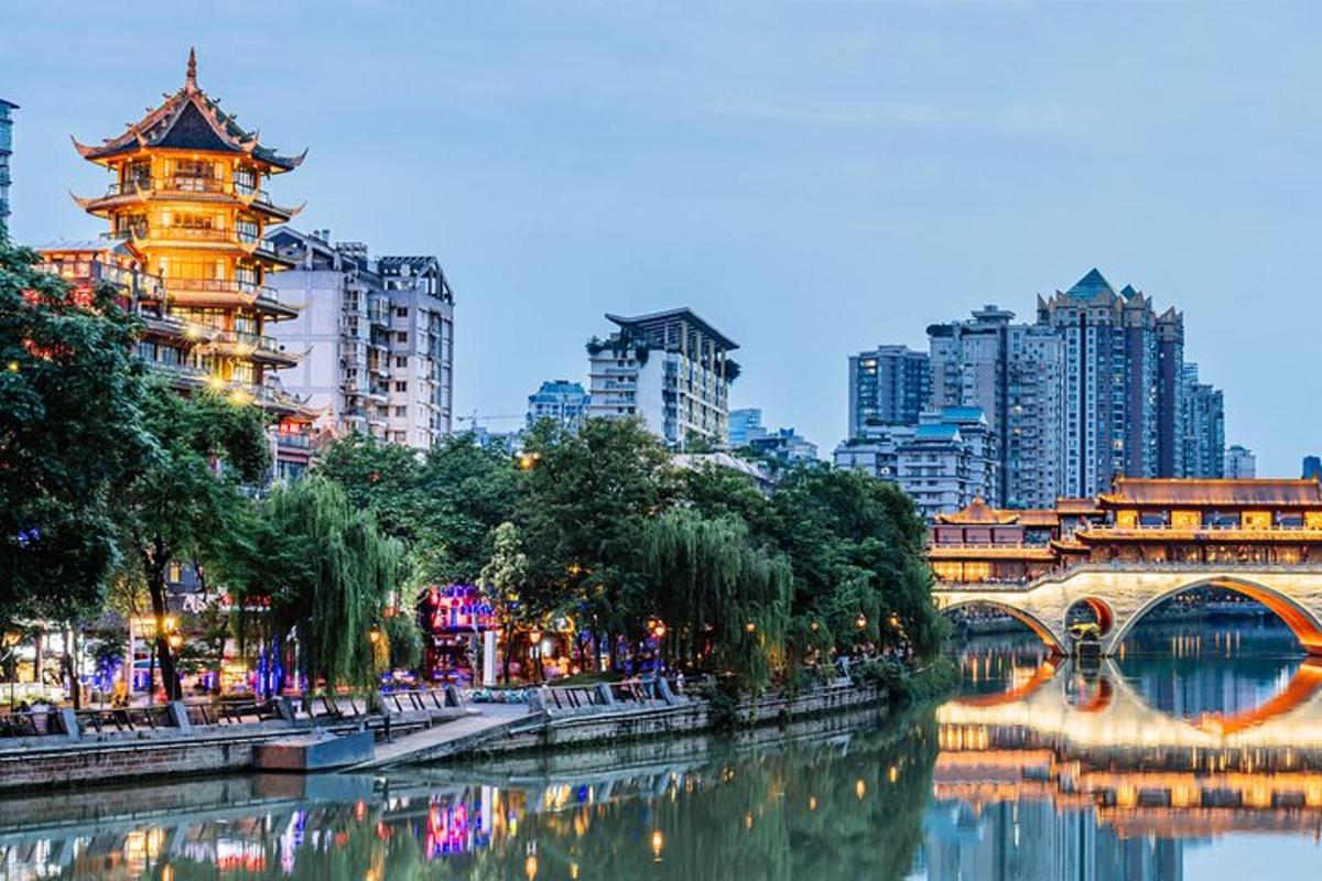 a city with a river and a bridge and buildings