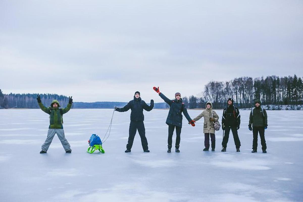 a group of people standing on the ice