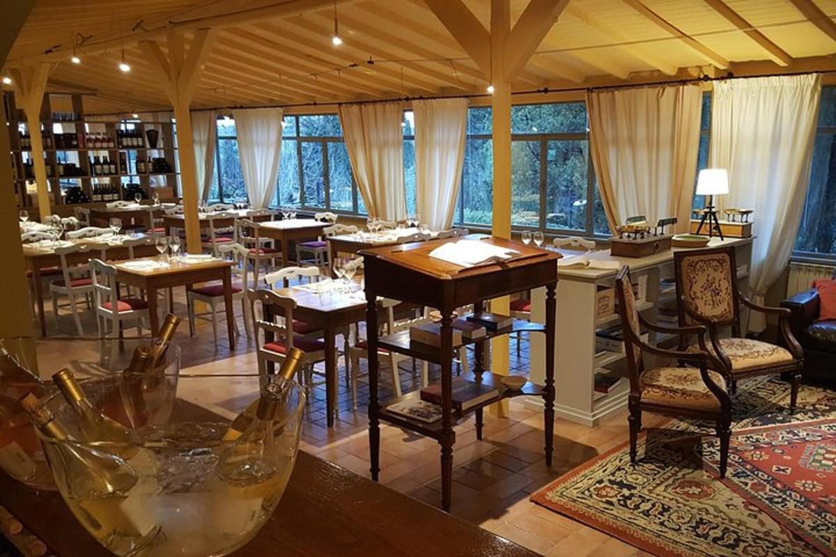 a restaurant with tables and chairs in a room