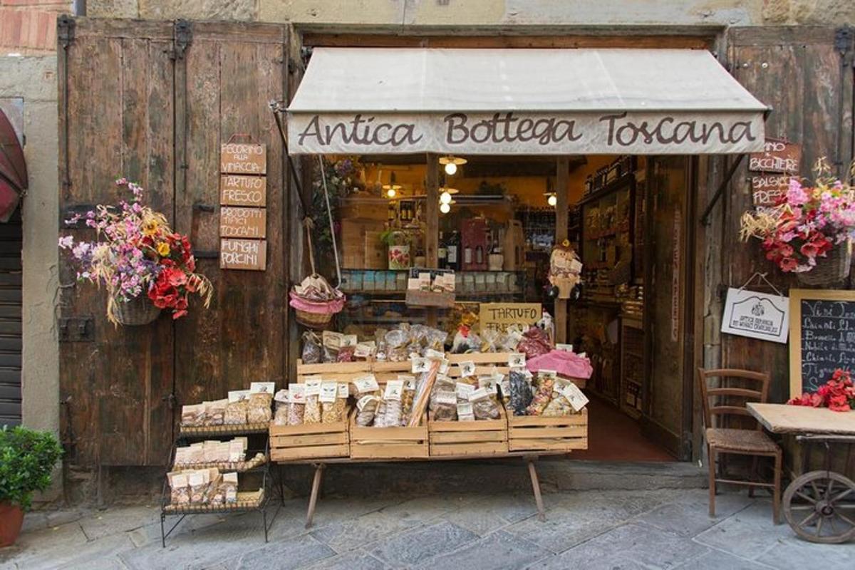 a store with a flower shop with a flower arrangement