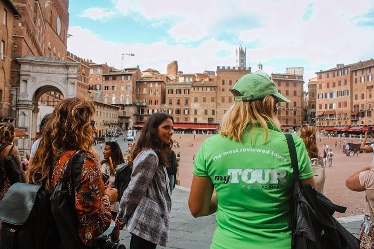 a group of people standing around in a city