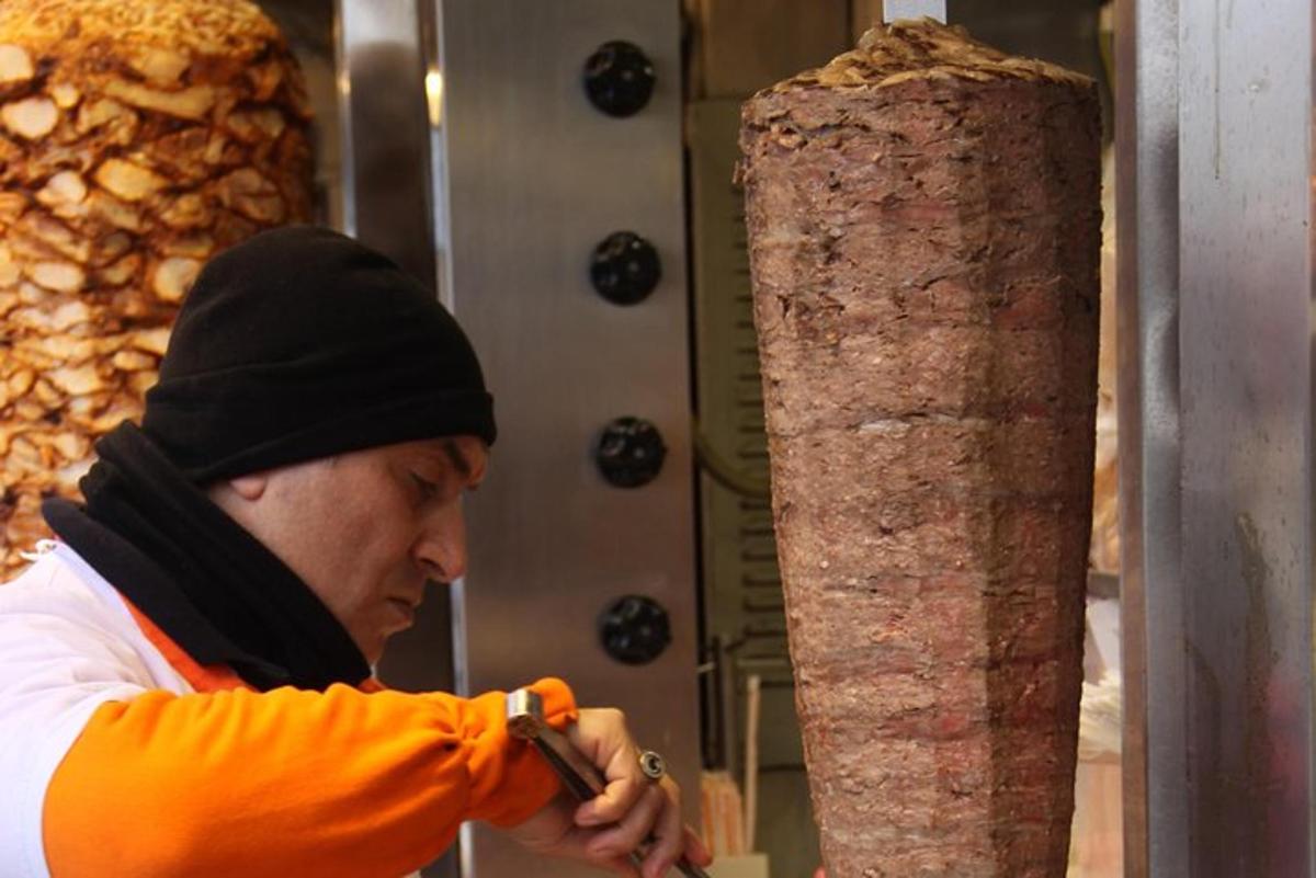 a man is looking at a column of food